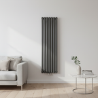 Anthracite grey vertical oval tube radiator in modern interior - square format