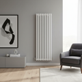 White vertical radiator in modern room setting