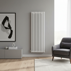 White vertical radiator in modern room setting